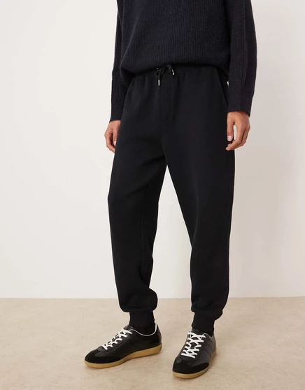 Дизайнерские спортивные брюки ASOS с зауженными манжетами черного цвета black
