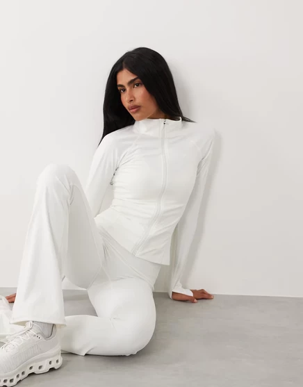 Трикотажная куртка для занятий йогой на молнии из трикотажа Gina темно-белого цвета off white