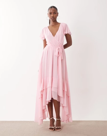 TFNC Bridesmaid chiffon v neck tie detail asymmetric hem maxi dress in baby pink pink