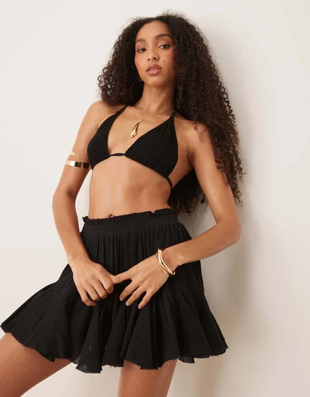 Пляжная мини-юбка в складку от ASOS DESIGN godet черного цвета black