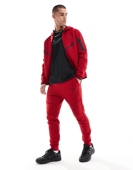 Спортивные брюки Nike Tech с флисовыми манжетами красного цвета red