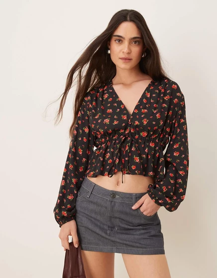 Черная блузка с розовым принтом Mango  black