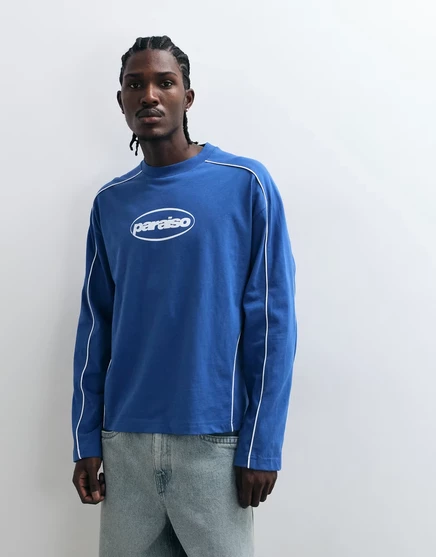 ДИЗАЙНЕРСКАЯ футболка свободного кроя с длинным рукавом оверсайз от ASOS DESIGN с рисунком paraiso синего цвета в стиле nouvean navy
