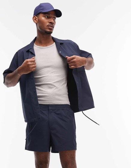 Шорты укороченной длины ASOS DESIGN motionMAX™ с четырьмя полосами эластичности темно-синего цвета - часть комплекта