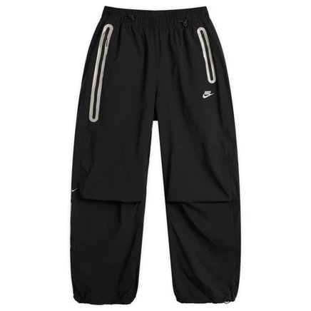 Спортивные брюки из ткани Nike Tech