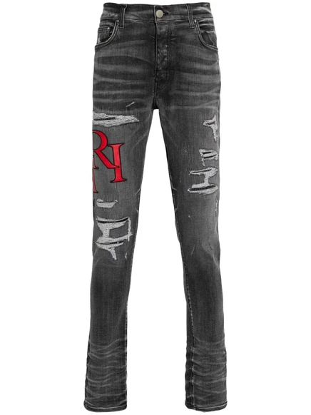 Потертые узкие джинсы AMIRI black