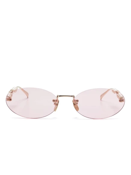 Солнцезащитные очки в овальной оправе Gucci Eyewear gold