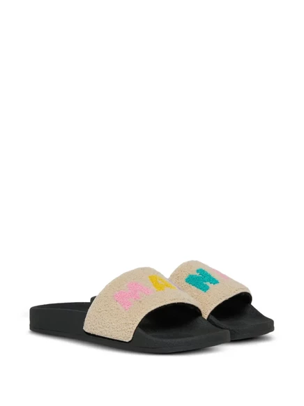 Слайды с детализацией логотипа Marni Kids