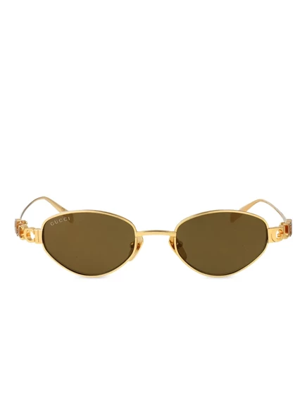 Солнцезащитные очки в овальной оправе Gucci Eyewear gold