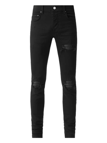 Рваные джинсы AMIRI MX1 black