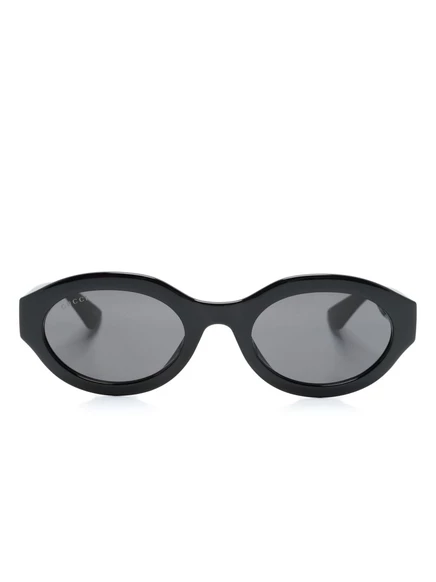 Женские солнцезащитные очки Gucci Eyewear с овальной оправой, черные