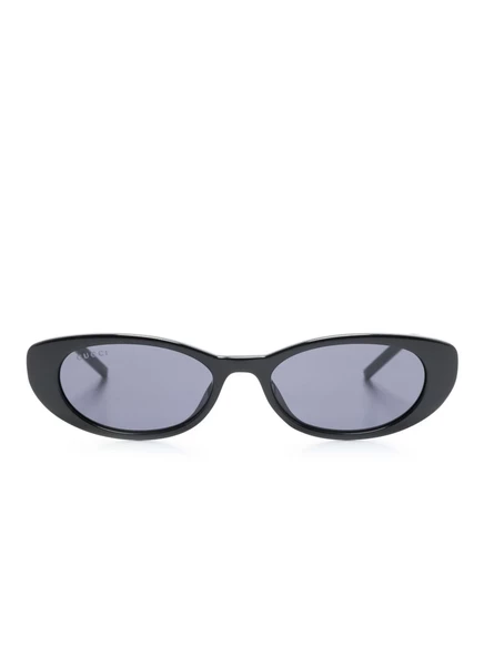 Солнцезащитные очки в овальной оправе Gucci Eyewear black
