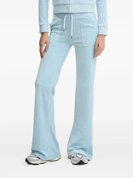 Велюровые брюки Juicy Couture с вышитыми карманами blue