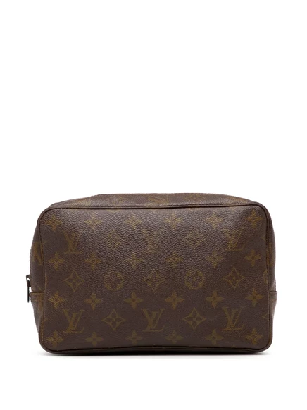 Клатч Louis Vuitton Trousse Toilette 23 в монограмме, коричневый