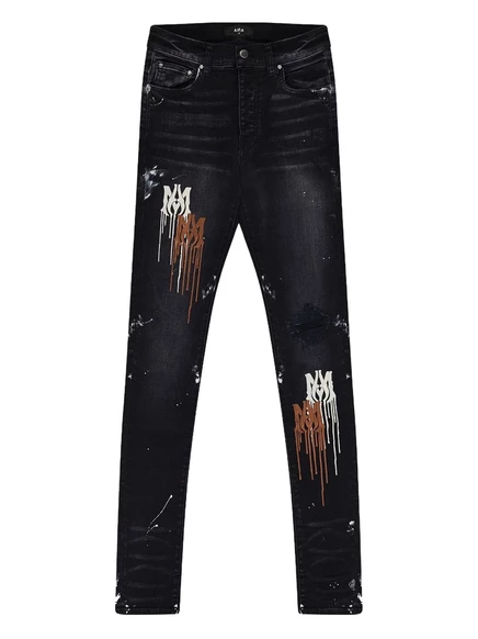 Джинсы с потеками краски от AMIRI black