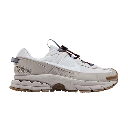 Кроссовки Nike Zoom Vomero Roam, серые с коричневой подошвой