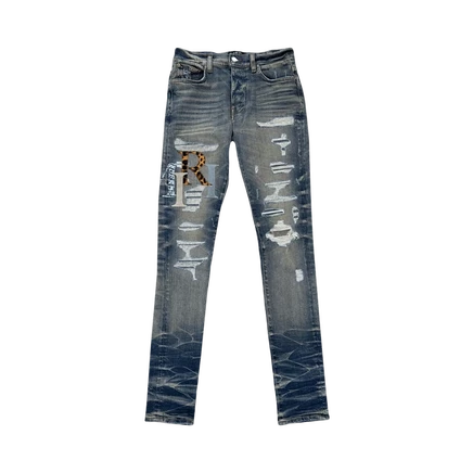 Джинсы Amiri Staggered Logo с кожаными вставками, синие