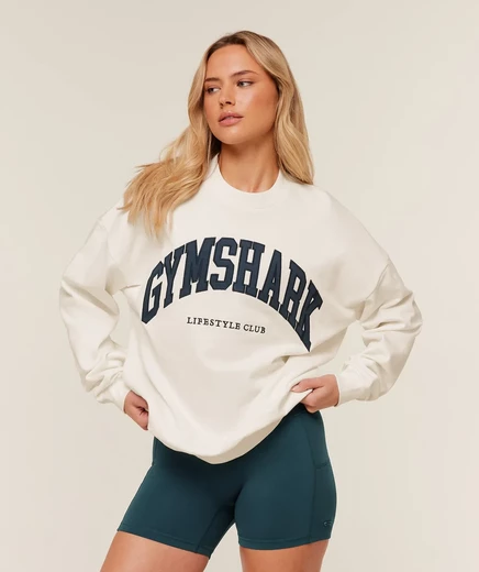 Женский свитшот Gymshark Collegiate с круглым вырезом и принтом, мягко-белый