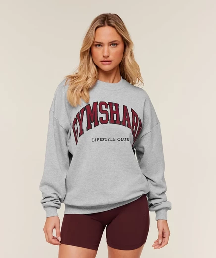 Женский пуловер Gymshark Collegiate, светло-серый меланж с красным принтом