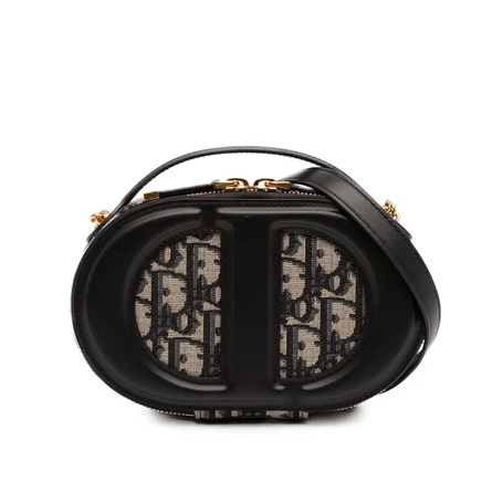 Женская сумка Dior CD Oval из кожи и канваса
