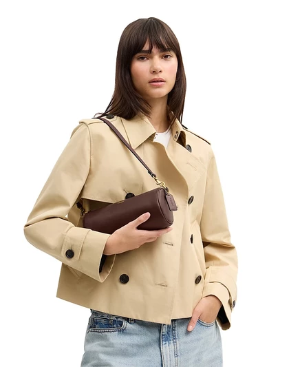 Маленькая кожаная сумка через плечо COACH Barrel коричневого цвета