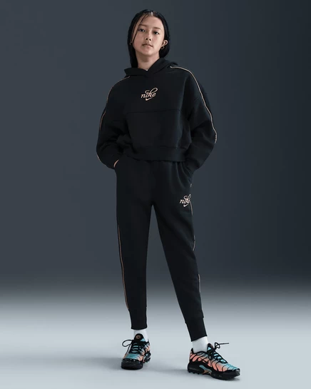Джоггеры для девочек Nike Club Fleece оверсайз, черные/золотистые