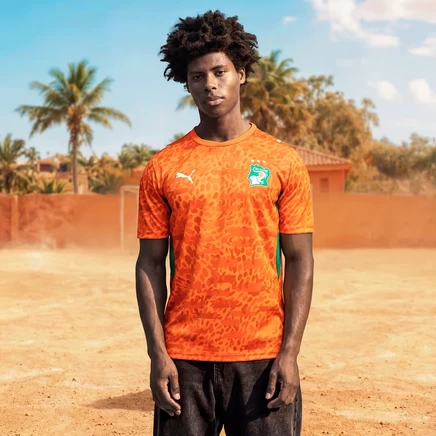Мужская футбольная футболка Puma Côte d'Ivoire Home, оранжевая с зелеными акцентами