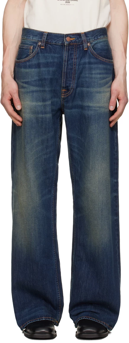 Джинсы Nudie Jeans темно-синего цвета с надписью Larry Jeans от грязи