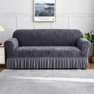 Чехол на диван Home Collection эластичный с юбкой, темно-серый