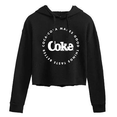 Женская толстовка Coca - Cola делает вещи вкуснее Укороченная толстовка с капюшоном и рисунком черного цвета