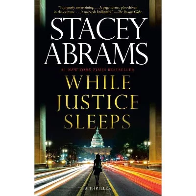 While Justice Sleeps - by Stacey Abrams paperback