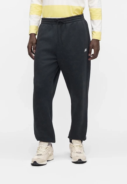 New Balance SPORT ESSENTIALS JOGGER - Tracksuit bottoms - sport green black