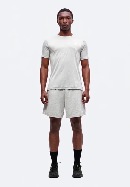 New Balance SPORT ESSENTIALS UTILITY - Sports T-shirt - athletic grey athletic grey