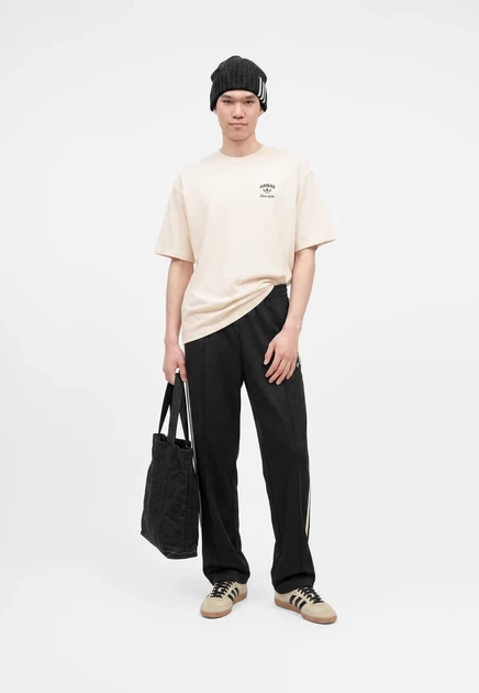 Унисекс брюки adidas Originals Firebird, черно-желтые