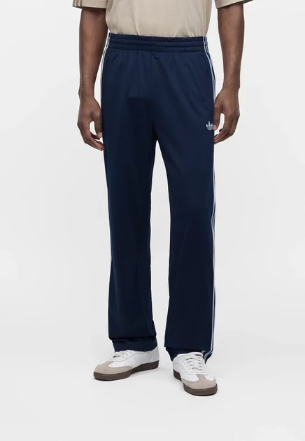 adidas Originals FIREBIRD TP - Tracksuit bottoms - black/bright blue night indigo/clear sky